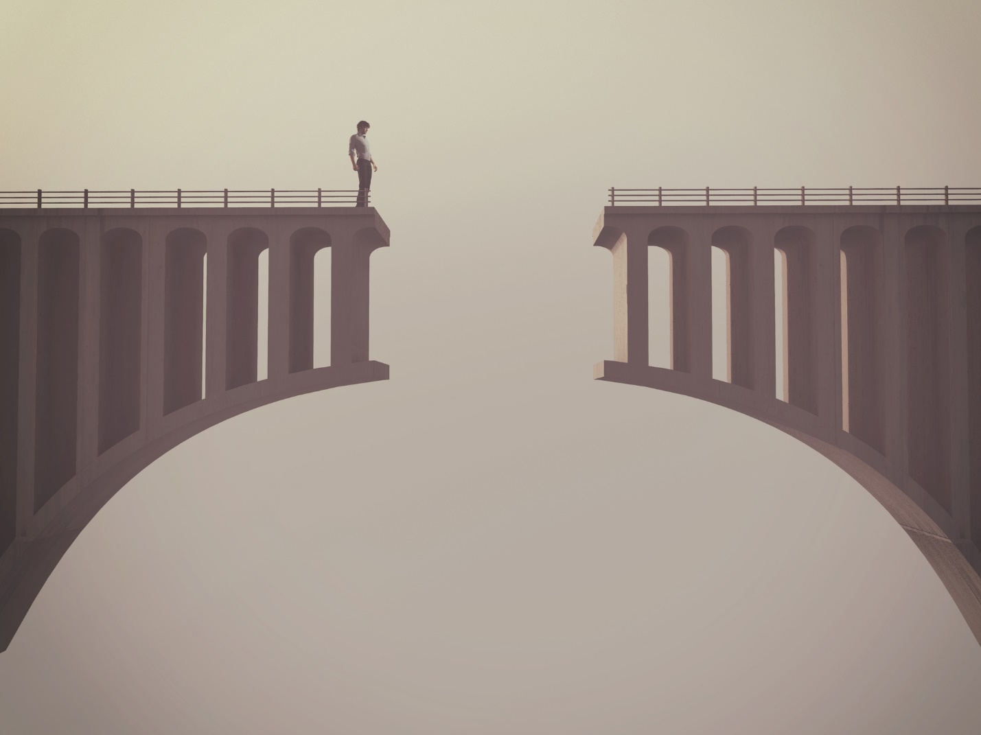 A person standing on a bridge

Description automatically generated with medium confidence