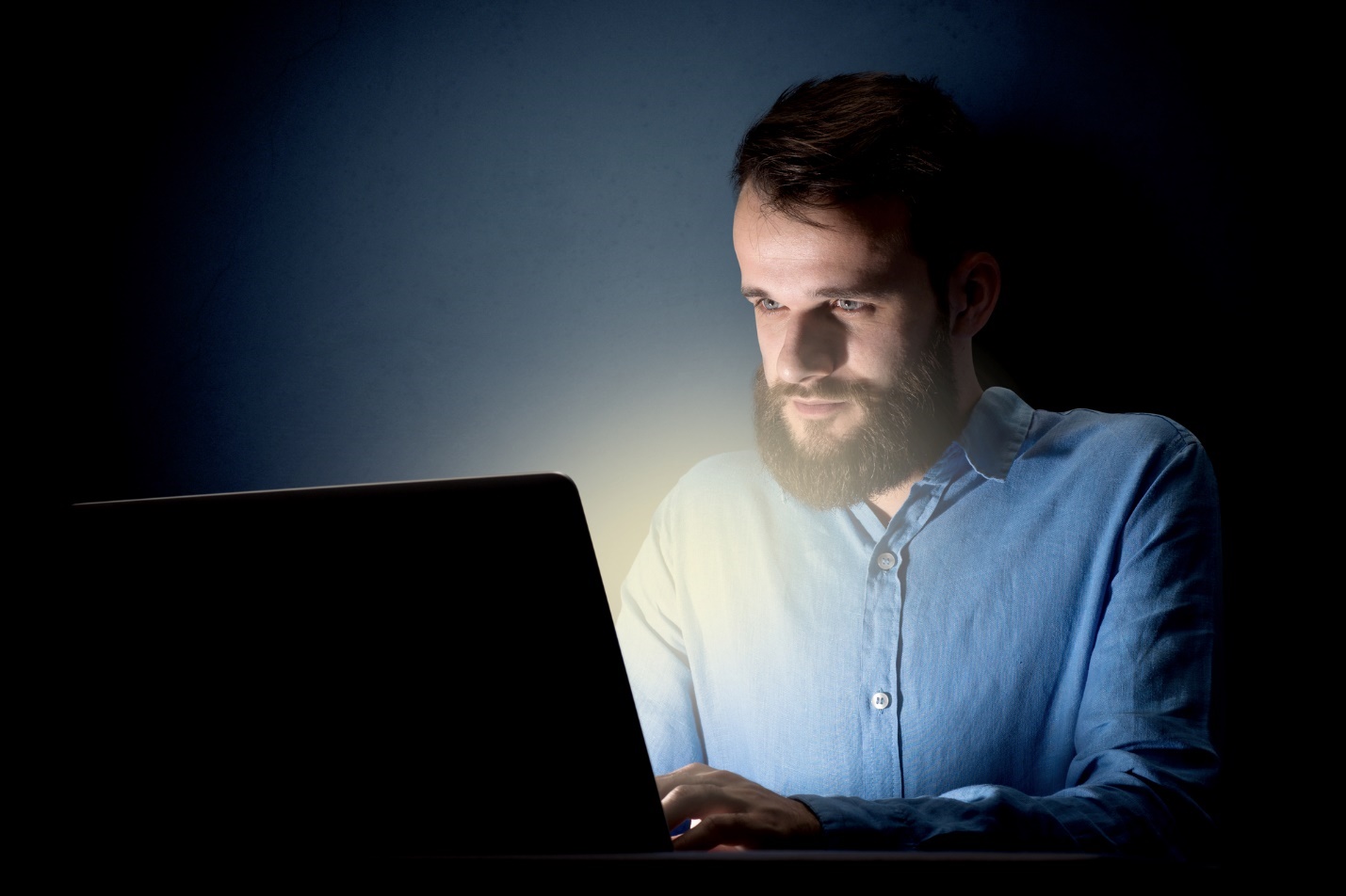 A person sitting in front of a computer

Description automatically generated with low confidence