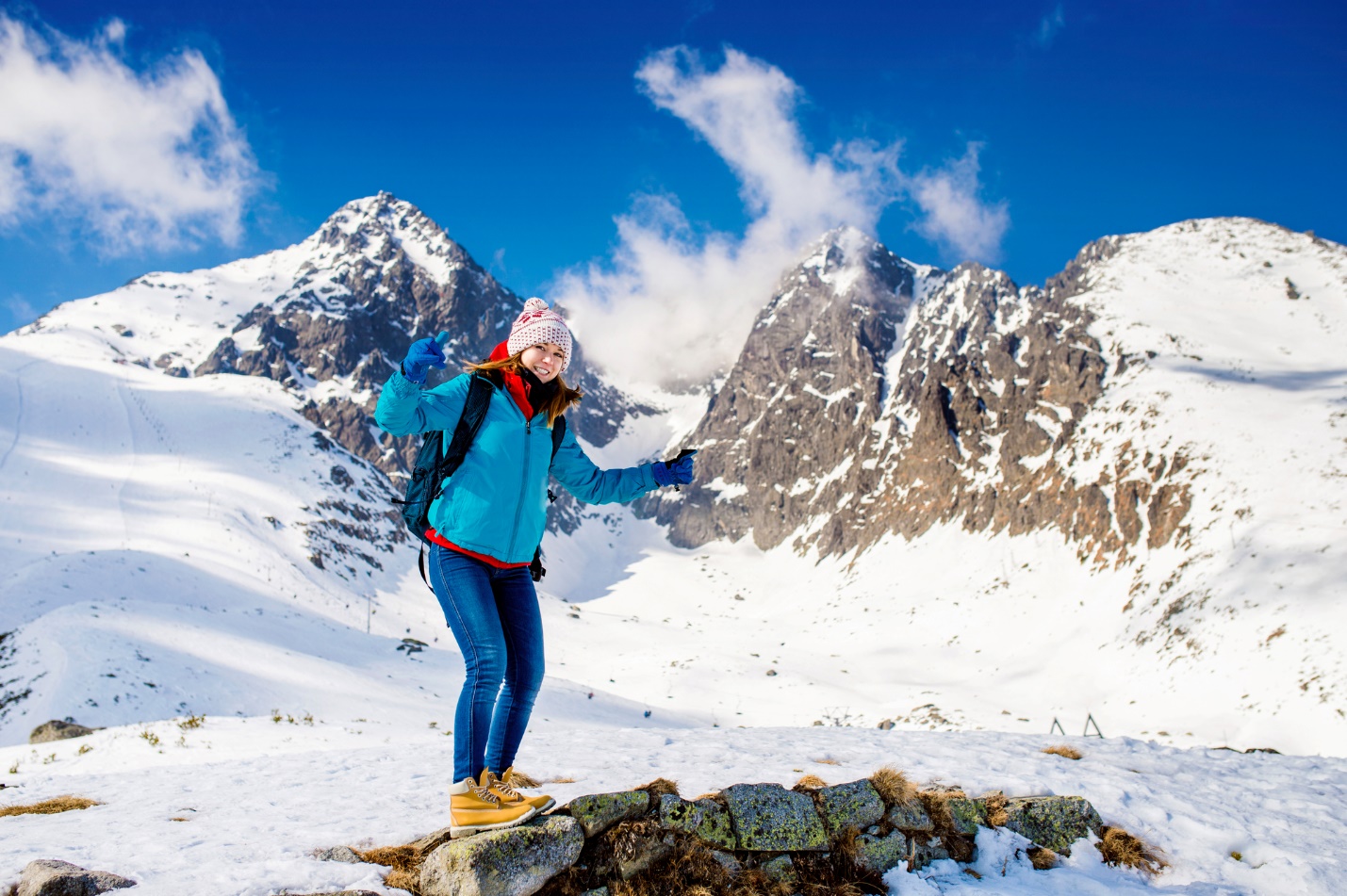 A person standing on a snowy mountain

Description automatically generated with medium confidence
