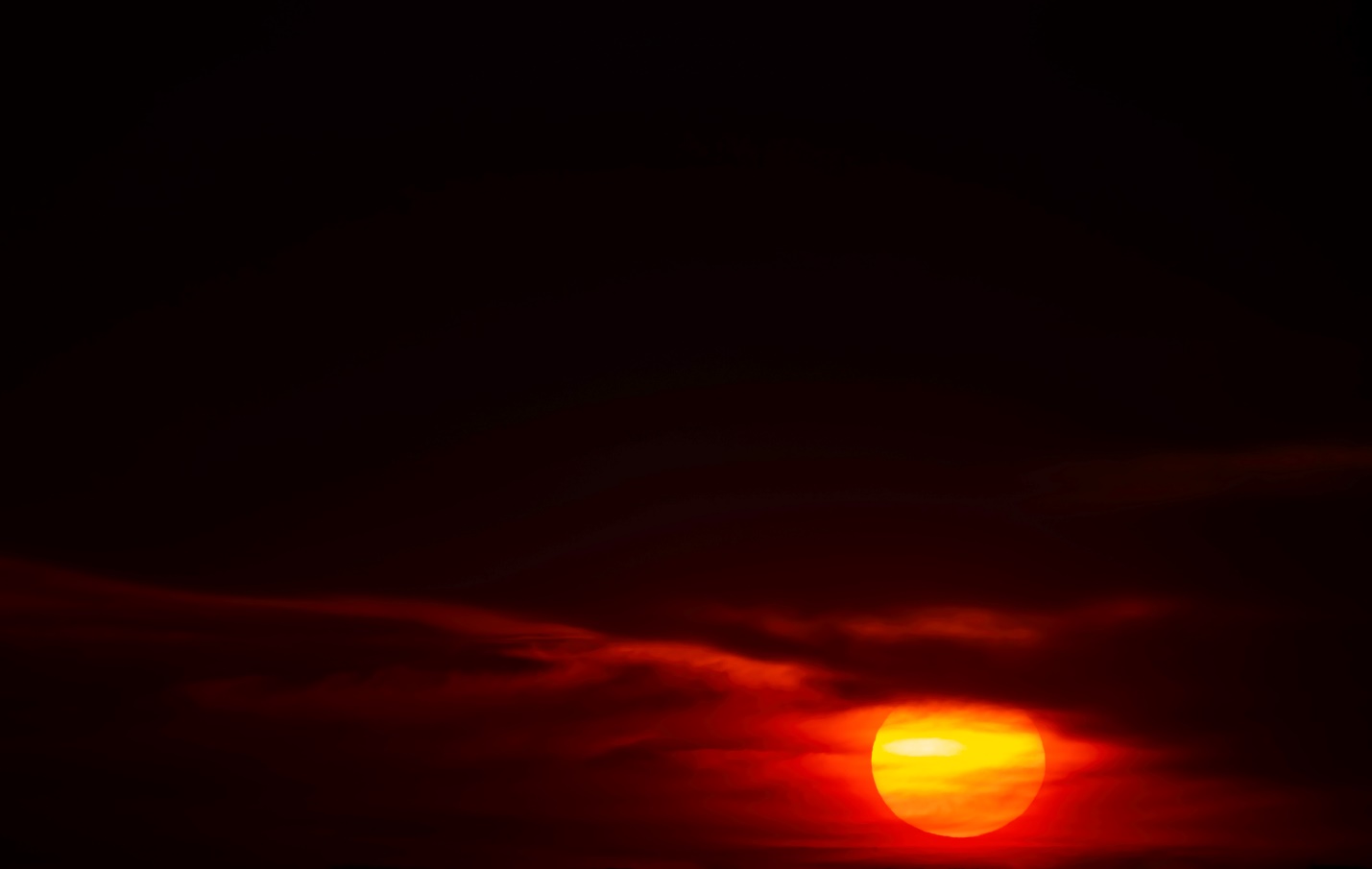 A picture containing sunset, night sky

Description automatically generated