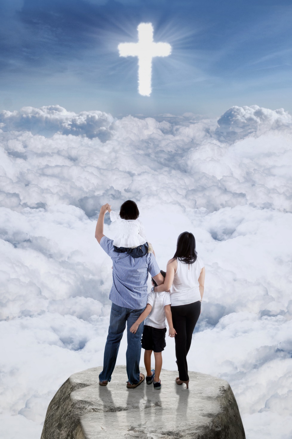 A family looking at a cross above the clouds

Description automatically generated with low confidence