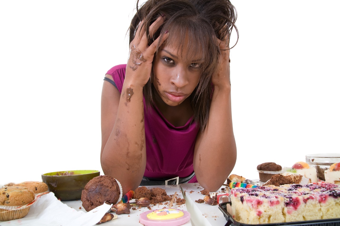 A person with nice hair and a nice table full of food

Description automatically generated