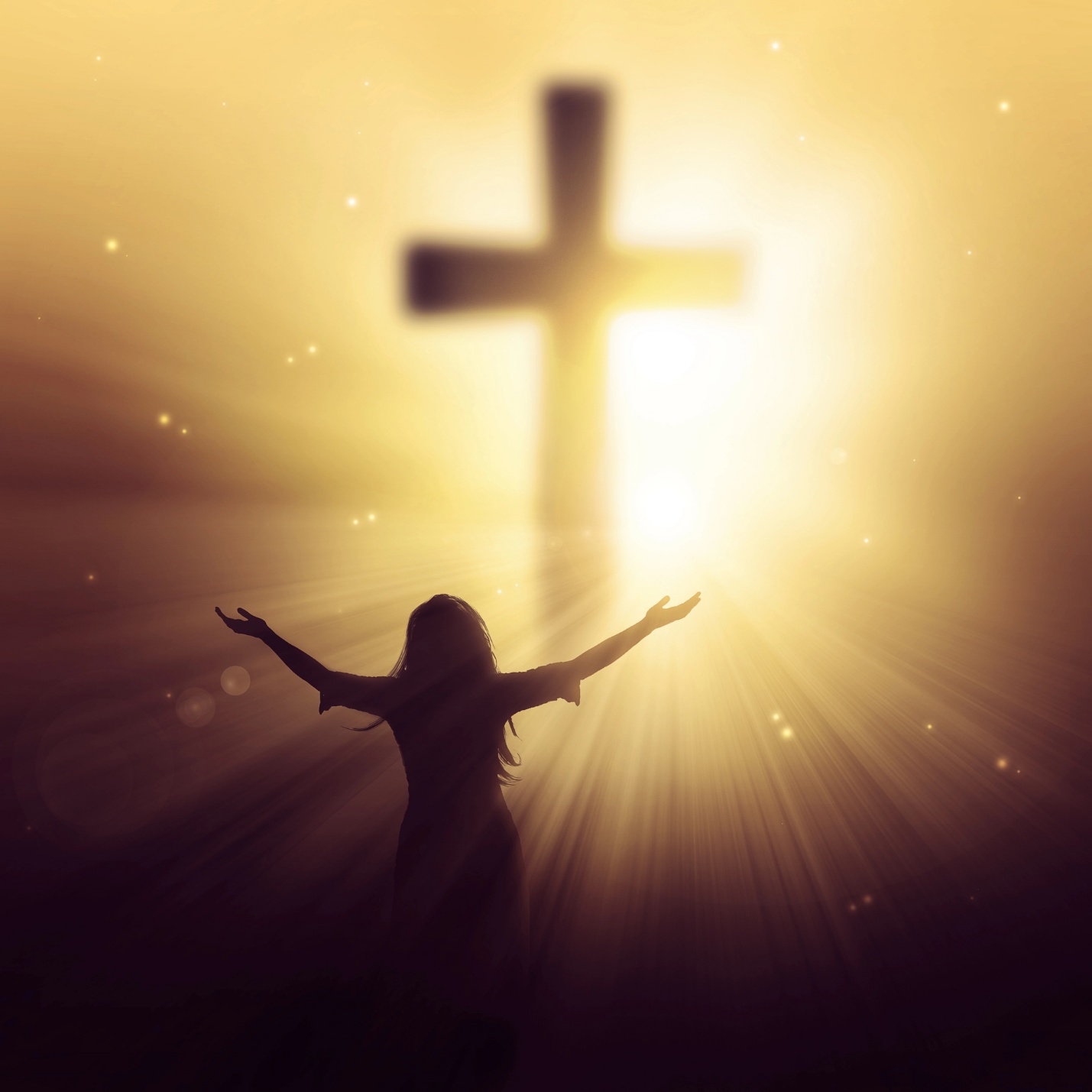 A silhouette of a person with her arms outstretched in front of a cross

AI-generated content may be incorrect.